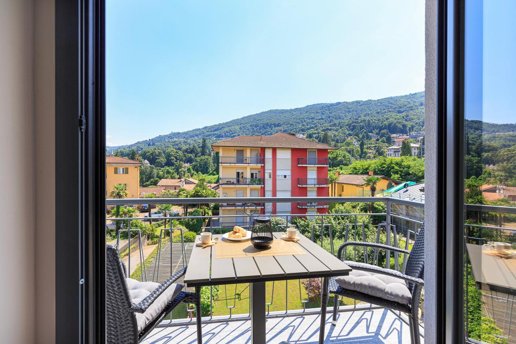 Elvezia Boutique Apartment Бавено Стая снимка