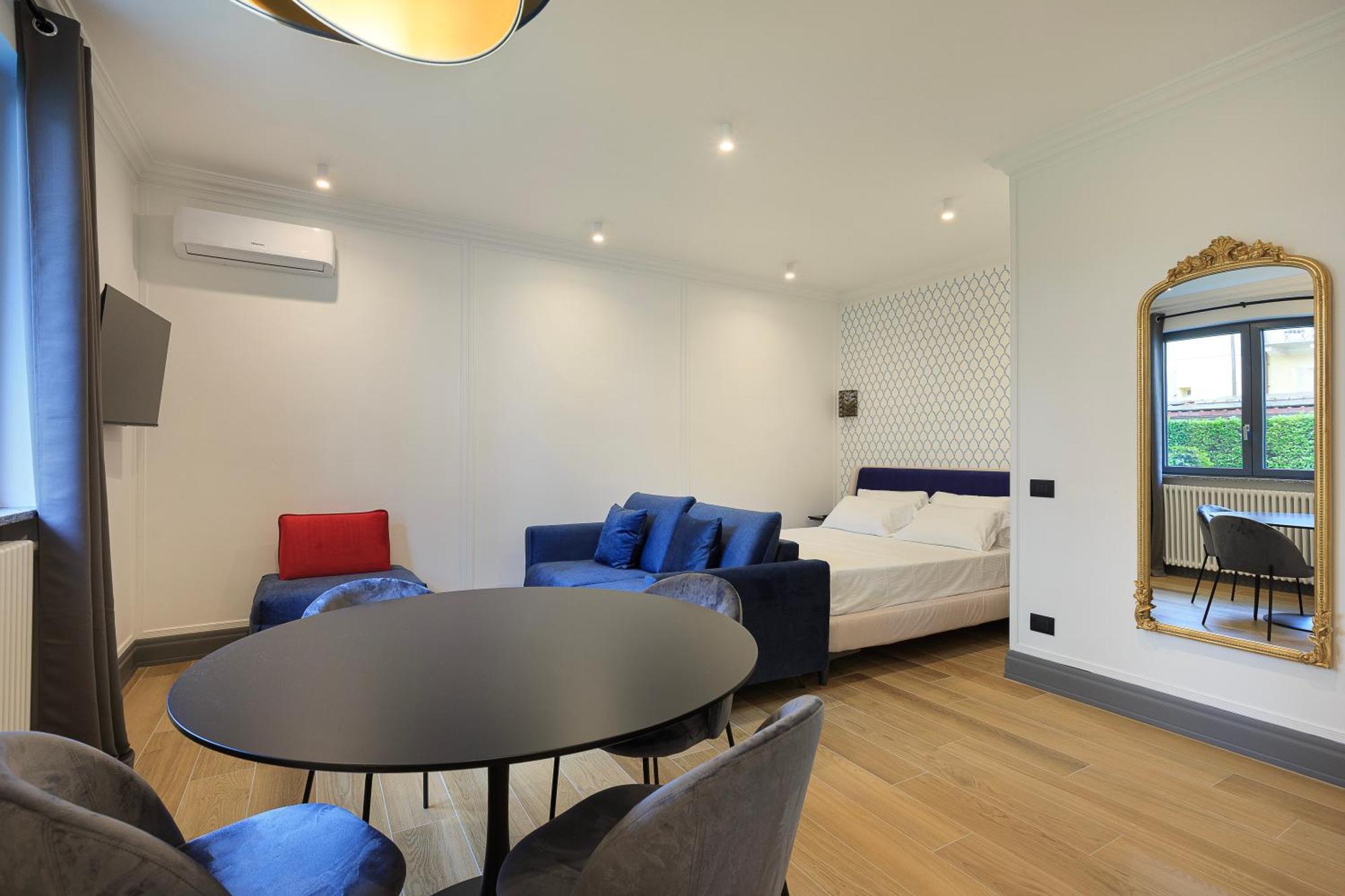 Elvezia Boutique Apartment Бавено Стая снимка